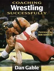 Book cover for "Coaching Wrestling Successfully" by Dan Gable