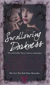 Book cover for "Swallowing Darkness" by Laurell K. Hamilton