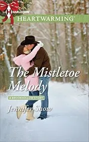 Book cover for "The Mistletoe Melody / Miracle Under the Mistletoe" by Jennifer Snow